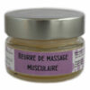 pot en verre de beurre de massage musculaire